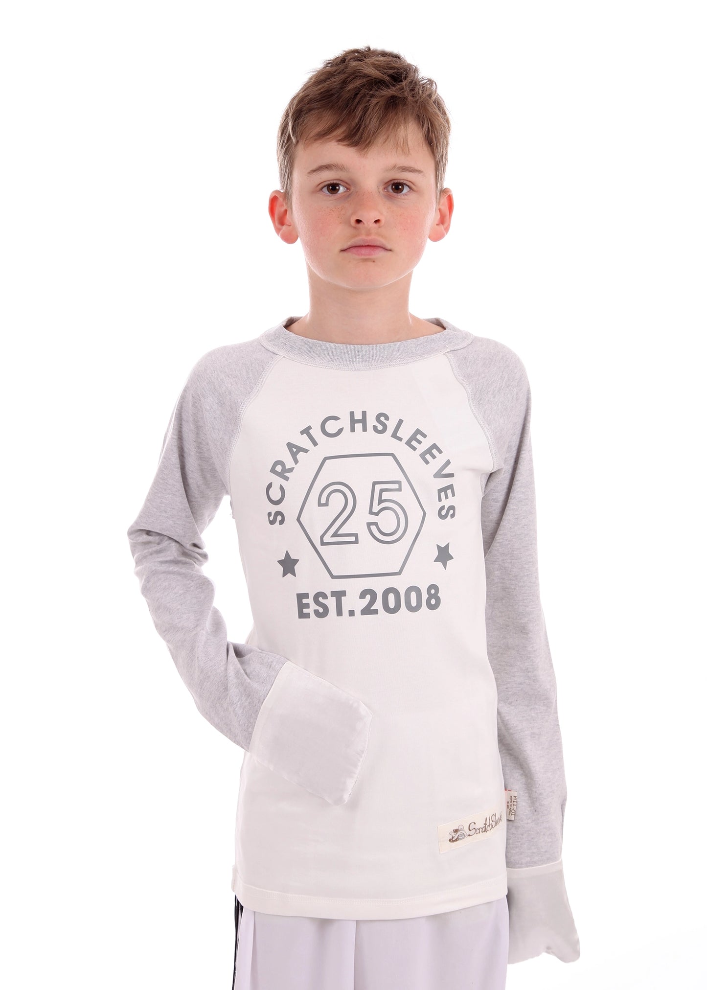 Children’s and teens’ Scratch Sleeves baseball-style tops designed for eczema relief, with gentle fabric and built-in scratch mitts to protect sensitive skin.